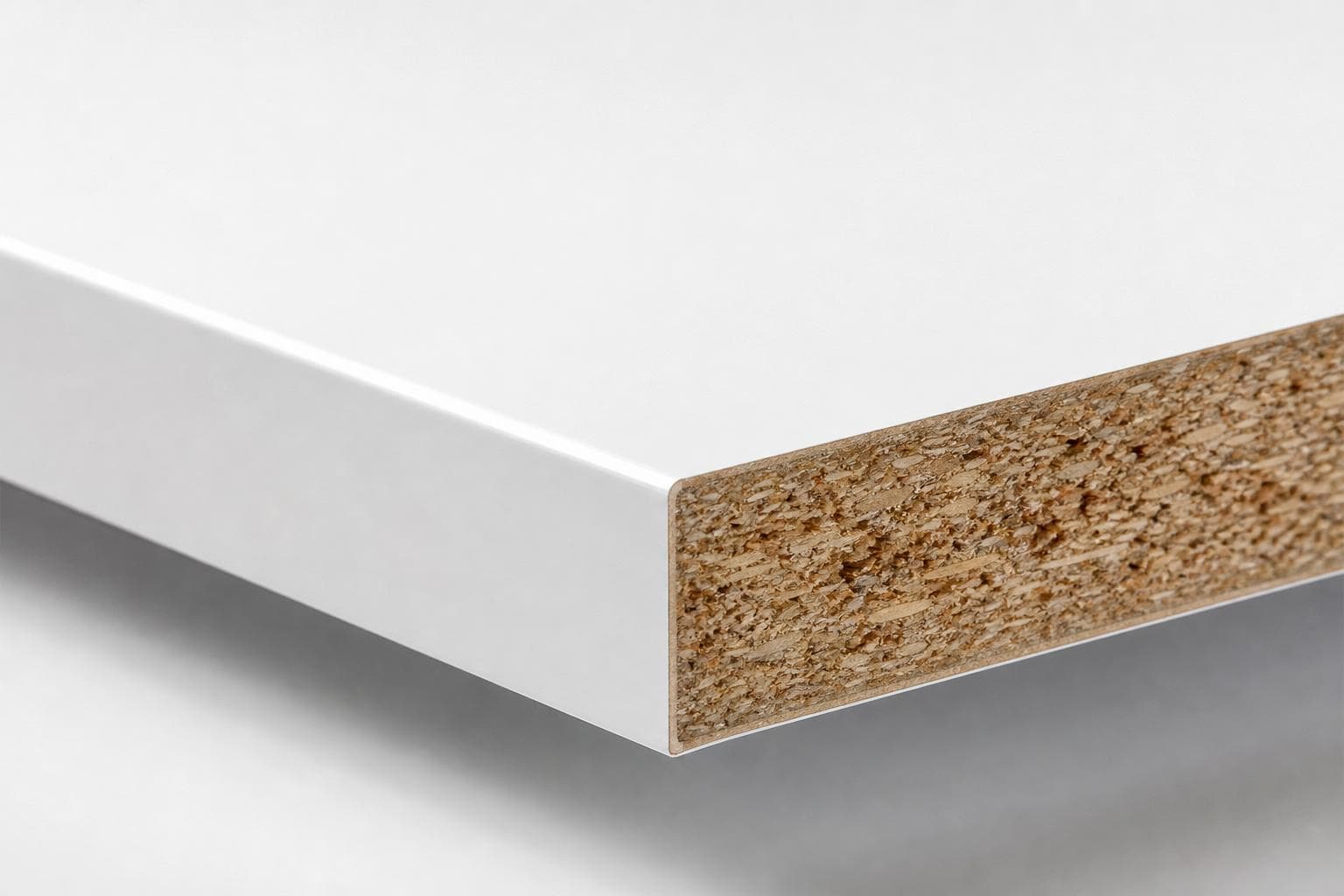 White melamine shelf board with a white edge-banded front and a particleboard core